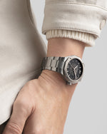 Load image into Gallery viewer, Baume & Mercier Riviera 10715 M0A10715 - cassa e bracciale in acciaio - quadrante nero fumé trasparente - polso
