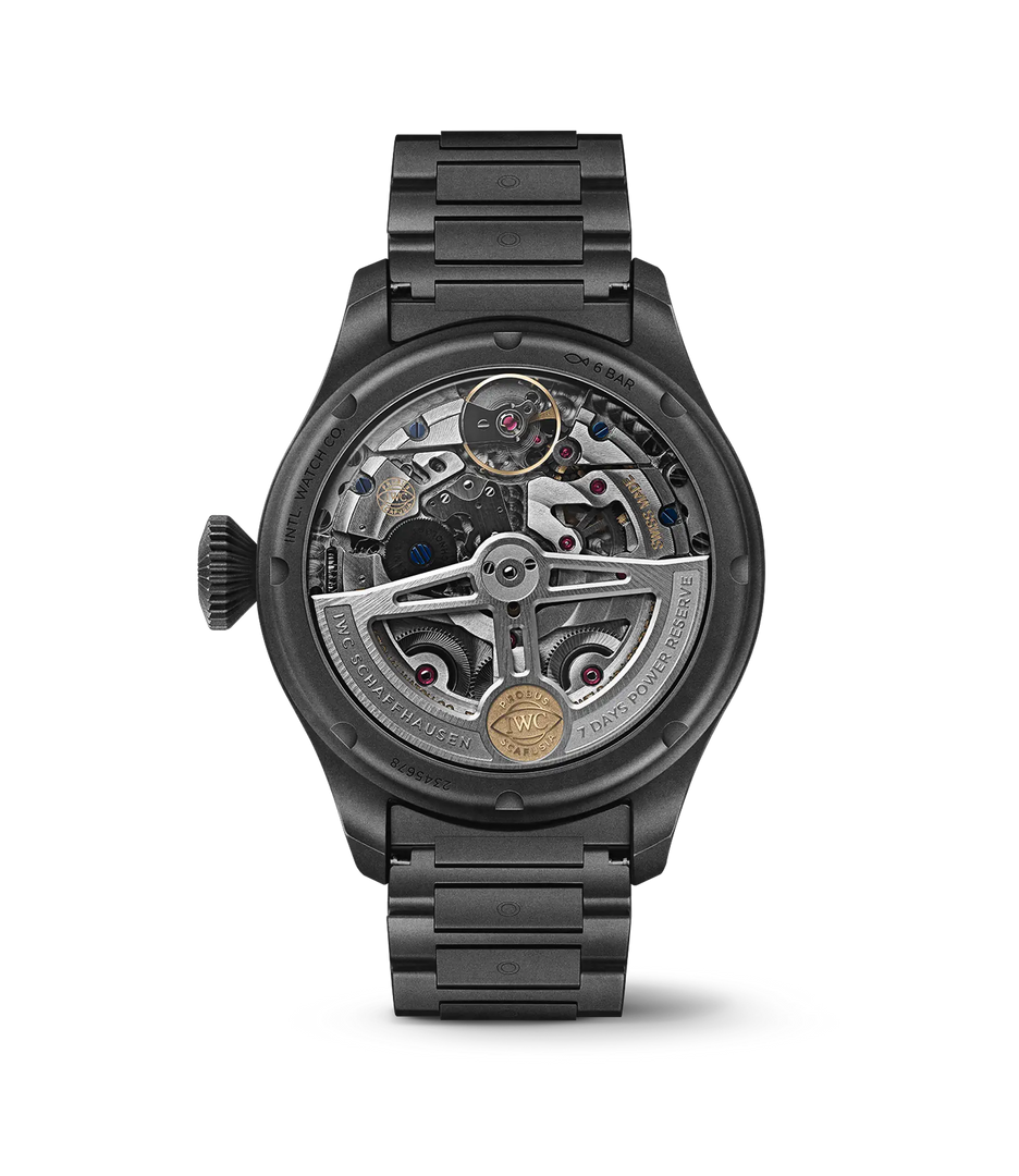 Quadrante nero opaco con indici grigi luminescenti e complicazioni calendario perpetuo.