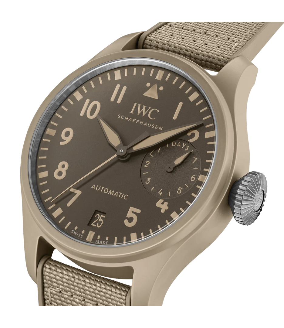 Cinturino in caucciù beige con inserto tessile coordinato e fibbia ad ardiglione in titanio.