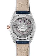 Load image into Gallery viewer, Cassa in acciaio spazzolato da 39 mm con lunetta zigrinata in oro Sedna™ 18K lucido e vetro zaffiro antiriflesso dell’Omega Constellation Globemaster