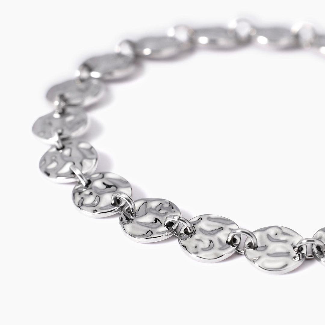 Bracciale con tondi effetto martellato