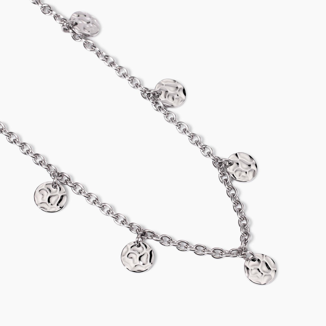 Girocollo con elementi effetto martellato