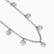 Girocollo con elementi effetto martellato