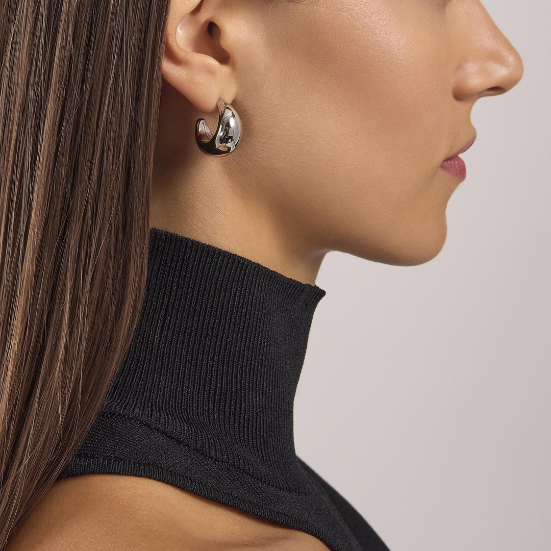 Orecchini a mezzaluna bombata