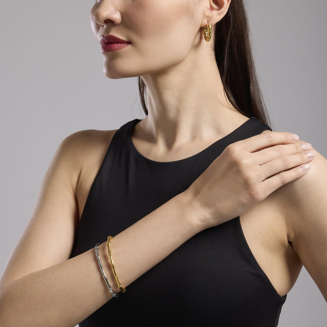 Orecchini bambù in acciaio dorato