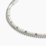 Load image into Gallery viewer, Bracciale con catene e perle conchiglia
