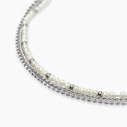 Bracciale con catene e perle conchiglia