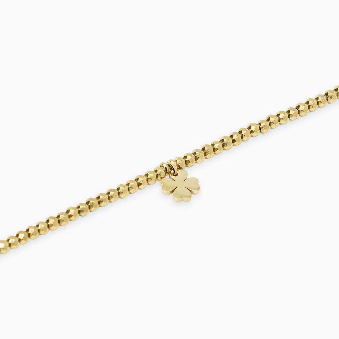 Bracciale dorato con ciondolo quadrifoglio