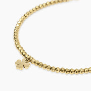 Bracciale dorato con ciondolo quadrifoglio