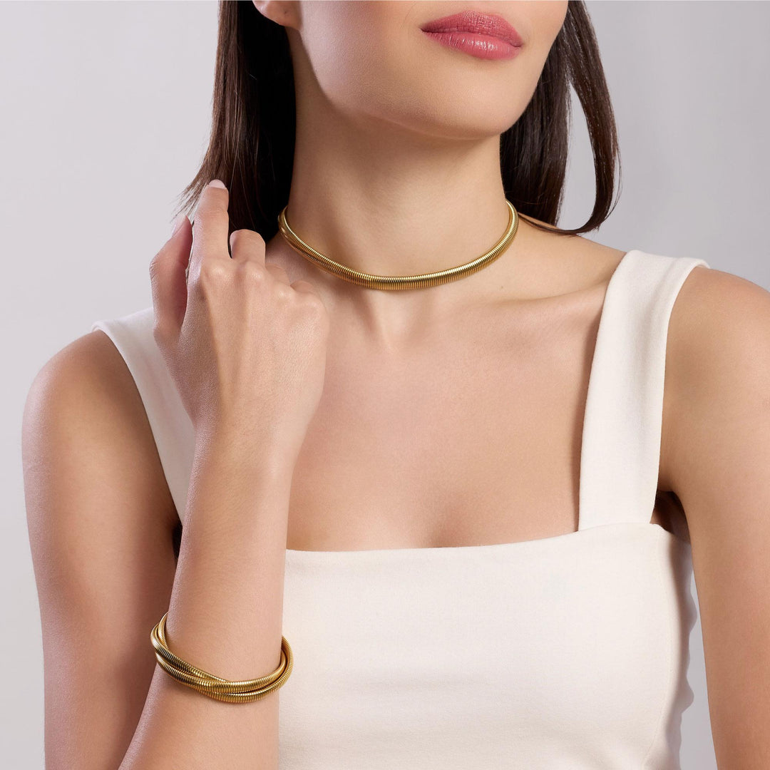 Bracciale dorato tubogas intrecciato