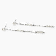 Orecchini con pendenti con perle conchiglia