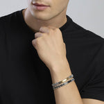 Load image into Gallery viewer, Bracciale nero con piastra e inserti in gunmetal
