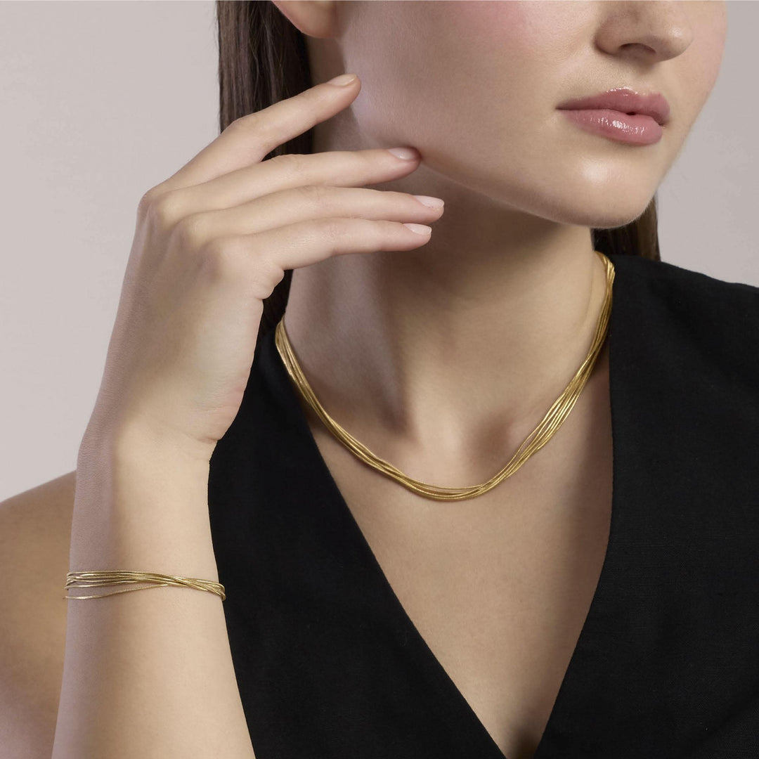 Kidult Bracciale multifilo dorato con catena snake 831151