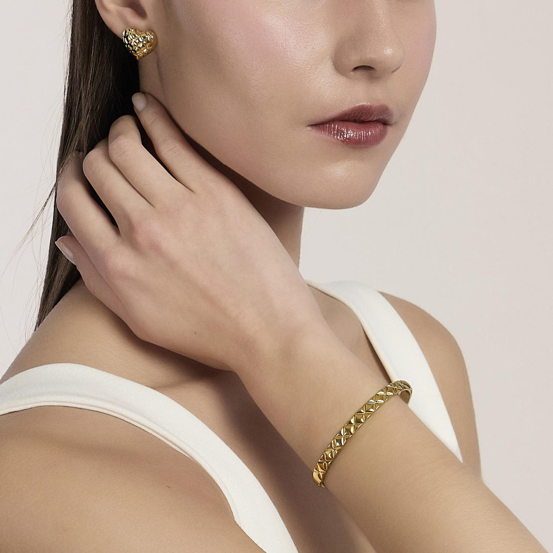 Kidult Bracciale bangle matelassé in dorato 831213