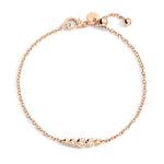 Load image into Gallery viewer, Bracciale Bollicine DoDo in oro rosa 9K con 3 diamanti bianchi (0,09 ct), design raffinato ed elegante.
