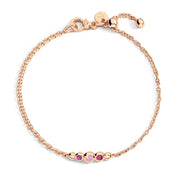 Bracciale Bollicine DoDo in oro rosa 9K con ametista, zaffiro rosa e rubino, design raffinato e colorato.