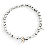 Load image into Gallery viewer, Bracciale Cuore DoDo in argento 925 con chiusura t-bar in oro rosa 9K, catena in argento 925 e anello brisé in acciaio.
