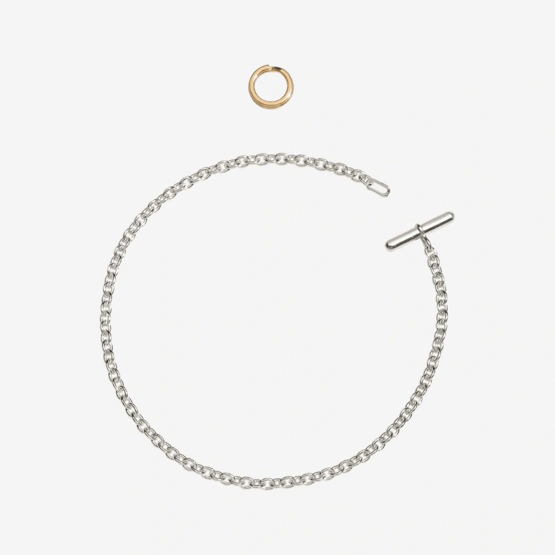Bracciale Essentials DoDo in argento 925 con anello Brisè in oro giallo 18K, design elegante e moderno.