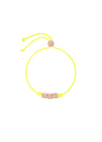 Load image into Gallery viewer, Bracciale Me DoDo con cordino giallo fluo e scritta &quot;ME&quot; in argento dorato oro rosa 18K, simbolo di self-love e stile moderno.
