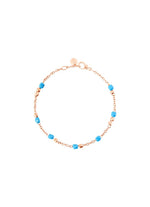 Load image into Gallery viewer, Bracciale Mini Granelli DoDo in oro rosa 9K e ceramica turchese, design naturale ispirato alla sabbia levigata dal mare.
