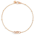Load image into Gallery viewer, Bracciale Nodo DoDo in oro rosa 9K con design nodo intrecciato simbolo di legame, inclusività e unione.
