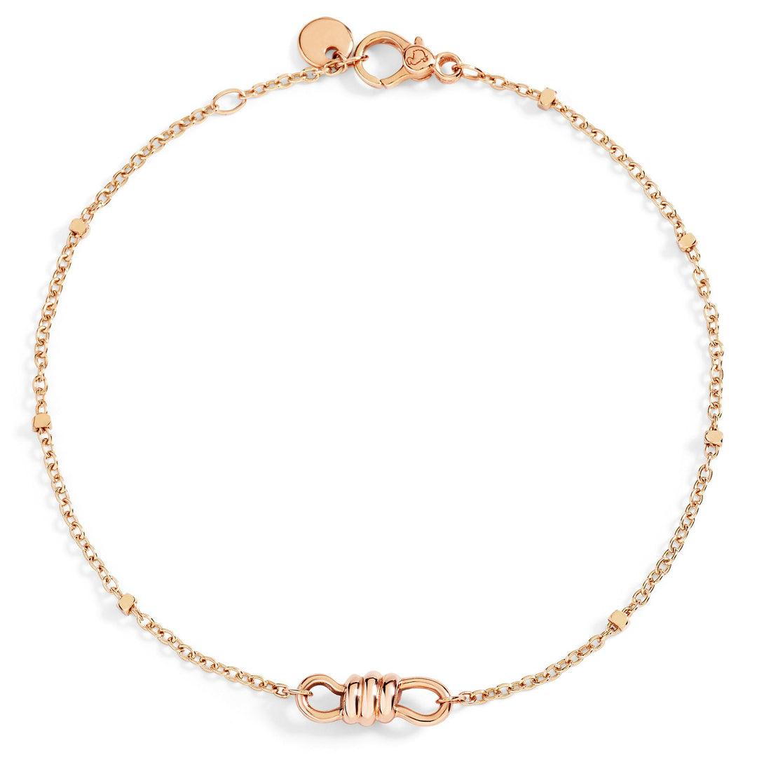 Bracciale Nodo DoDo in oro rosa 9K con design nodo intrecciato simbolo di legame, inclusività e unione.