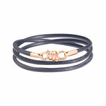 Load image into Gallery viewer, Bracciale Nodo Dodo in oro rosa 9K con cinturino in pelle grigia, simbolo di unione e amicizia.
