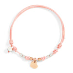 Load image into Gallery viewer, Bracciale Pad Mini Cuore DoDo in oro rosa 9K e argento 925 con charm cuore mini, mini Granelli e cordino rosa regolabile.
