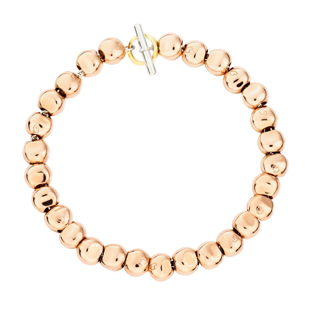 Bracciale Pepita DoDo in oro rosa 9K e argento 925 con anello brisè in oro giallo, design ispirato a pietre levigate dal mare.