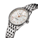 Load image into Gallery viewer, Dettaglio laterale della cassa in acciaio lucido del Breitling Navitimer 32mm con lunetta perlata e vetro zaffiro.
