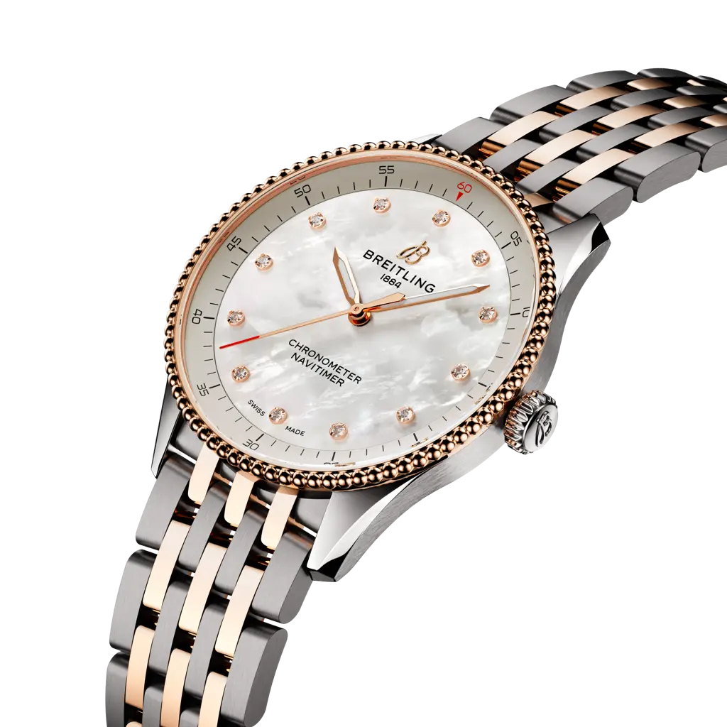 Cassa in acciaio inox e 18k oro rosso da 32 mm e cinturino in metallo bicolore del Breitling Navitimer 32 con lunetta fissa