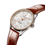 Cassa in acciaio inox e oro rosso 18 carati da 32 mm con vetro zaffiro bombato antiriflesso su entrambi i lati e lunetta fissa in oro rosso