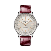 Quadrante bianco del Breitling Navitimer Automatic 36 con lancette e indici luminescenti, e regolo calcolatore circolare iconico