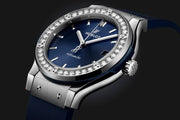 Hublot Classic Fusion Titanium 38mm Diamonds 565.NX.7170.RX.1204 - cassa titanio - lunetta con diamanti - cinturino caucciù blu - quadrante blu con datario