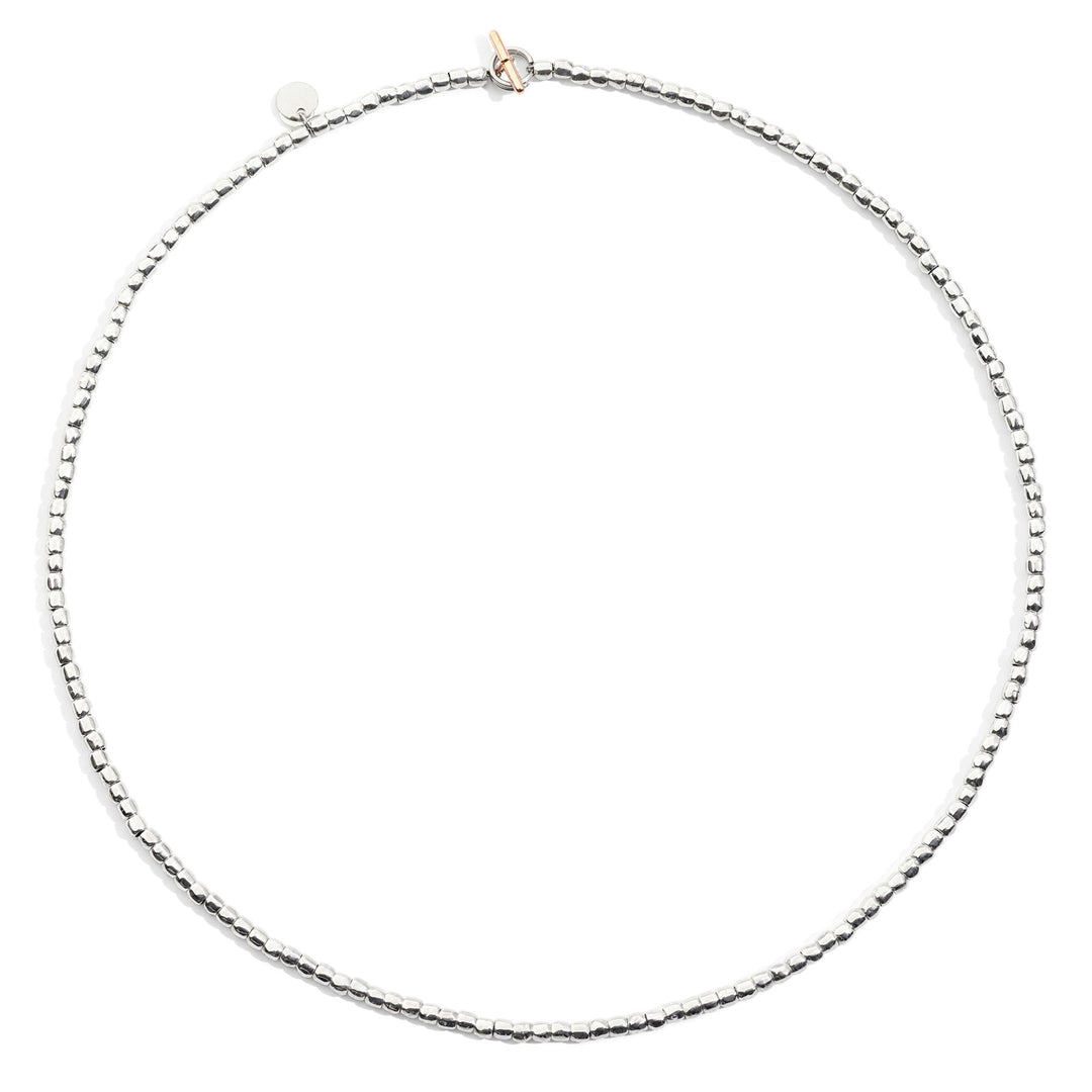 Collana Mini Granelli DoDo in argento 925 e oro rosa 9K con catena e anello brisé in acciaio, chiusura t-bar in oro rosa, lunghezza 42 cm.