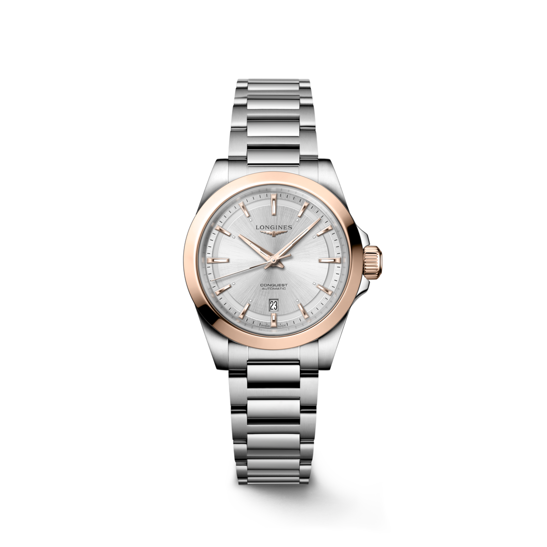 Orologio Longines Conquest L33205726 con cassa in acciaio da 30 mm e maglia centrale in oro rosa 18 carati, quadrante argenté a raggi di sole con indici applicati e lancette rosa.