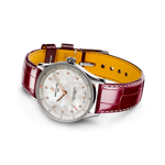 Load image into Gallery viewer, Dettaglio delle lancette luminose e lunetta a perline dell’orologio Navitimer 32, con puntale rosso dei secondi.
