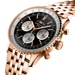 Load image into Gallery viewer, Profilo laterale della cassa in oro rosso 18 carati con vetro zaffiro bombato antiriflesso del Navitimer B01 Chronograph 43.
