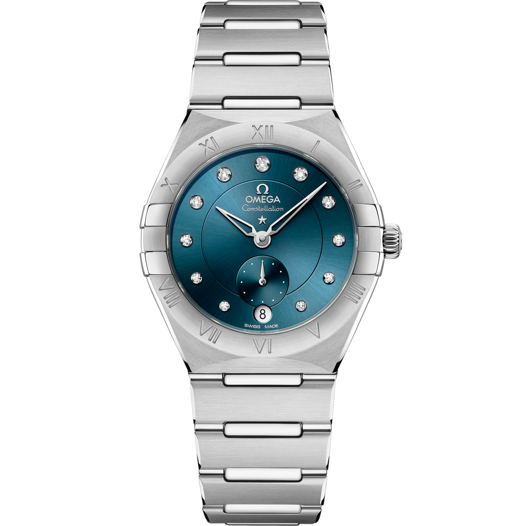 Quadrante argentato con indici in diamanti progressivi incastonati su supporti in oro bianco 18K e contatore piccoli secondi a ore 6 dell’Omega Constellation 34 mm
