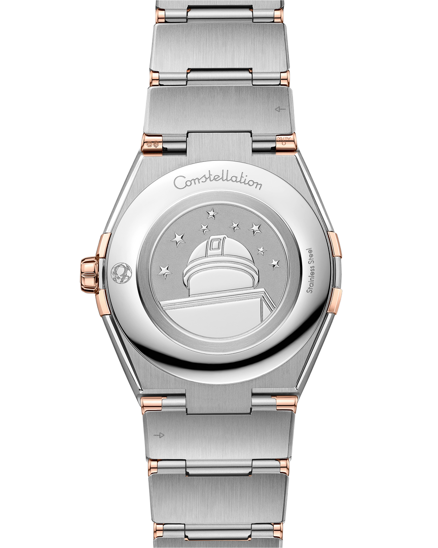 Cassa in acciaio inox e oro Sedna™ 18K da 36 mm con lunetta in oro Sedna™ e numeri romani incisi