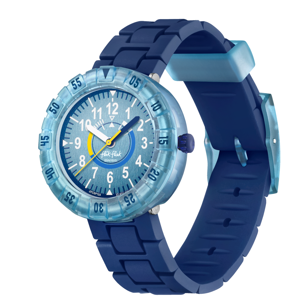 Orologio Flik Flak Bluebrick FCSP133 con cassa in plastica e cinturino in tessuto blu.