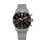 Load image into Gallery viewer, Quadrante blu sunburst con indici applicati luminescenti e contatori cronografici del Breitling Superocean Heritage B01 Chronograph 42.
