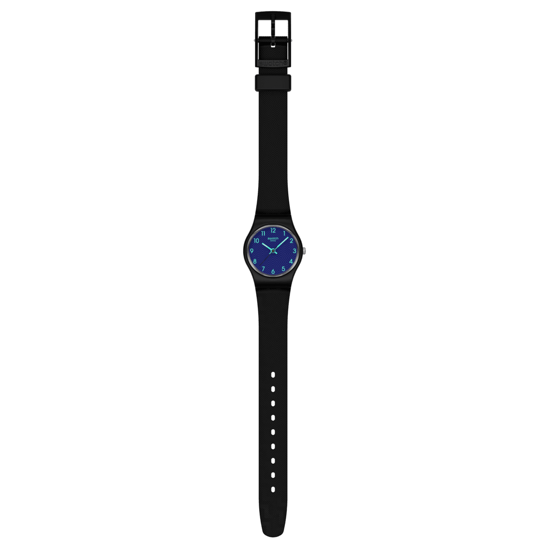 Vista frontale dello Swatch Grace in Time LB188 con quadrante elegante blu scuro e lancette verdi chiaro per una facile lettura.