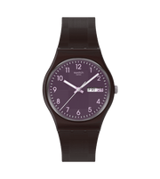 Orologio Swatch Weaving Wonders modello SO28C700 con cassa rotonda grigia in plastica e quadrante viola con lancette rosa e bianca.