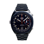 Load image into Gallery viewer, Quadrante nero scheletrato con indici blu luminescenti, due contatori cronografici e datario blu luminescente dell&#39;orologio TAG Heuer Monza Chrono
