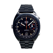 Quadrante nero scheletrato con indici blu luminescenti, due contatori cronografici e datario blu luminescente dell'orologio TAG Heuer Monza Chrono