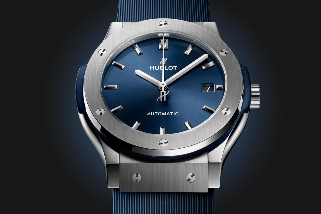Hublot Classic Fusion Titanium Blue 511.NX.7170.RX - cinturino gomma blu - cassa e lunetta in titanio - quadrante blu con datario
