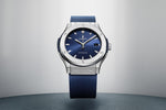 Load image into Gallery viewer, Hublot Classic Fusion Titanium Blue 511.NX.7170.RX - cinturino gomma blu - cassa e lunetta in titanio - quadrante blu con datario