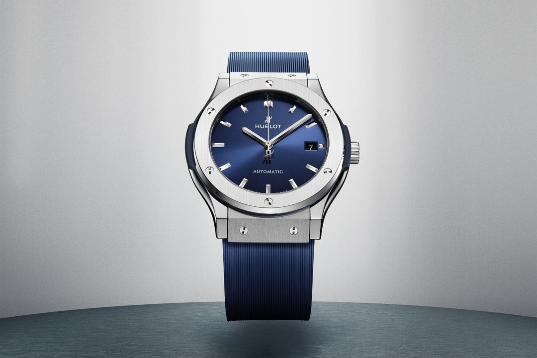 Hublot Classic Fusion Titanium Blue 511.NX.7170.RX - cinturino gomma blu - cassa e lunetta in titanio - quadrante blu con datario