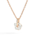 Load image into Gallery viewer, Immagine del ciondolo fiore oro rosa e diamanti su sfondo neutro, accessorio elegante e luminoso.
